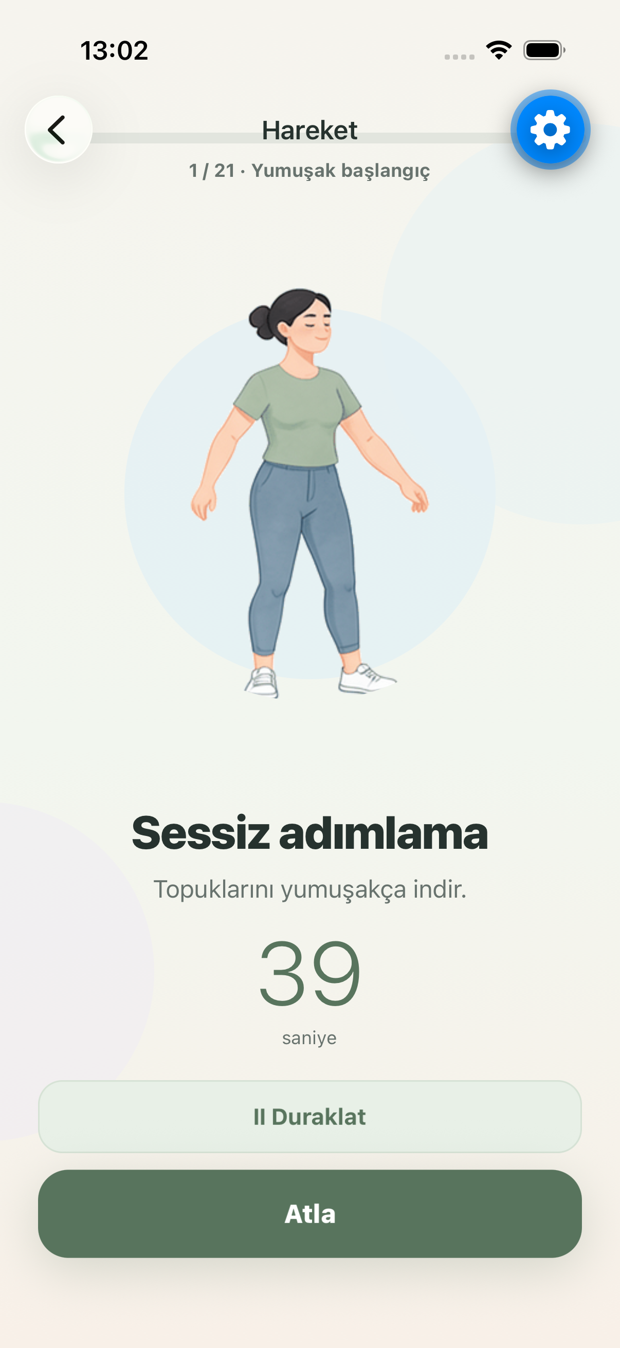 Soft Cardio session screen with a large exercise guide, timer, pause and skip controls
